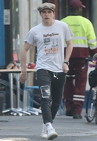 Brooklyn beckham in a newsboy cap