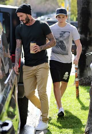 Stylish men getting coffee