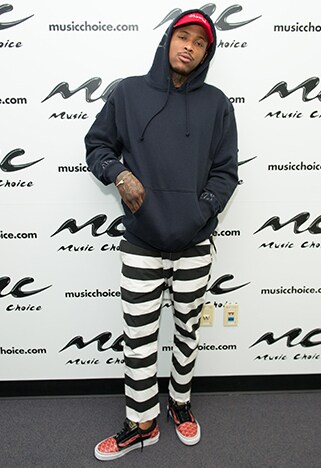 YG wearing stripes