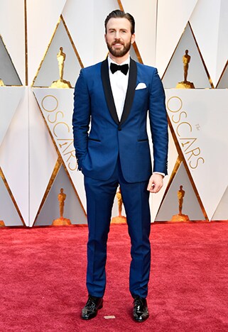 Chris Evans wearing blue tuxedo and black bowtie at oscars