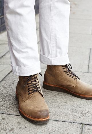 Tan suede workman boots with black laces