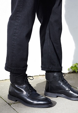 Black lace-up leather boots for men