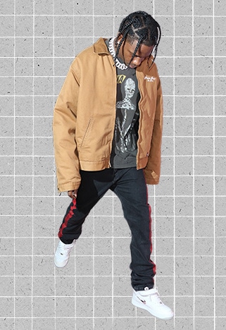 ASOS Outfit Of The Month #21 Travis Scott Wearing A Brown Workwear Jacket, Band Tee, Balenciaga Side Stripe Jeans And Nike Air Force Trainers.