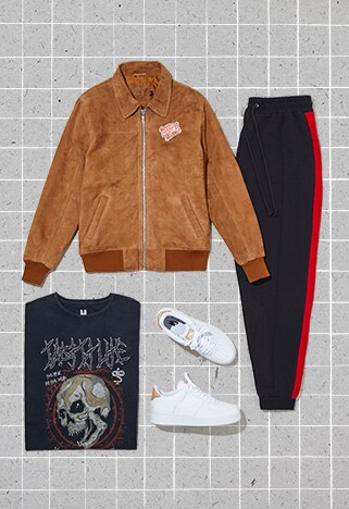 ASOS Outfit Of The Month #21 Travis Scott Wearing A Brown Workwear Jacket, Band Tee, Balenciaga Side Stripe Jeans And Nike Air Force Trainers.