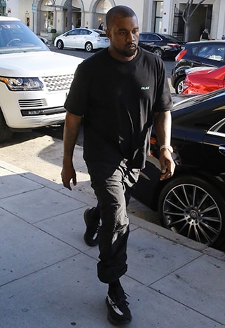 Kanye West wearing socks over his joggers | ASOS Style Feed