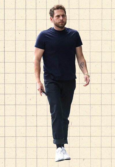 Jonah Hill wearing a basic navy tee