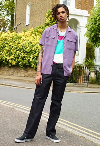 Model wearing a revere-collared shirt and straight-leg jeans | ASOS Style Feed