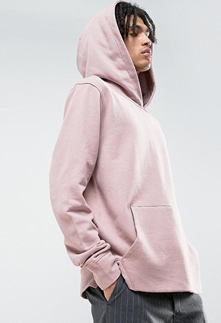 Dusty pink hoodie on male model with dreadlocks