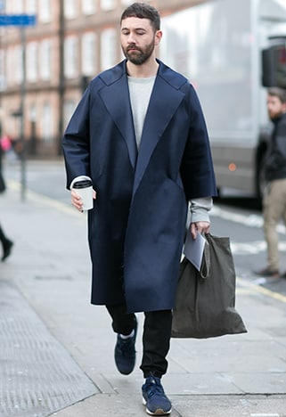 Model wearing an oversized navy jacket with matching trousers and shoes | ASOS Style Feed