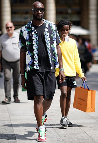 Virgil Abloh wearing a patterned shirt and black shorts | ASOS Style Feed