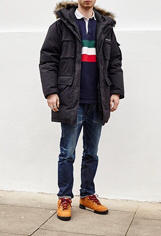 Nic wearing parka and rugby shirt