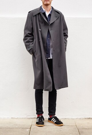 John Agnew in sleuthy grey trench coat