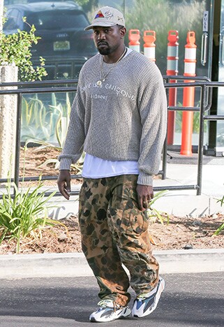 kanye west in a super-oversized 90s knit. most stylish guys of 2017 so far 