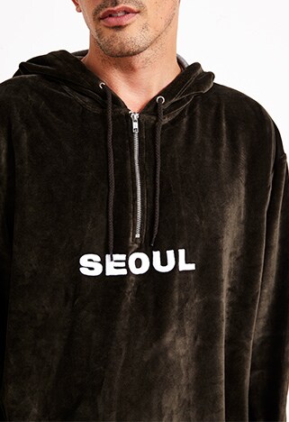 ASOSer wearing a velour half-zip hoodie | ASOS Style Feed