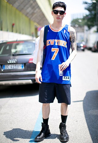 A street-styler wearing a basketball jersey | ASOS Style Feed
