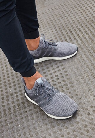 ASOSer wearing grey trainers | ASOS Style Feed