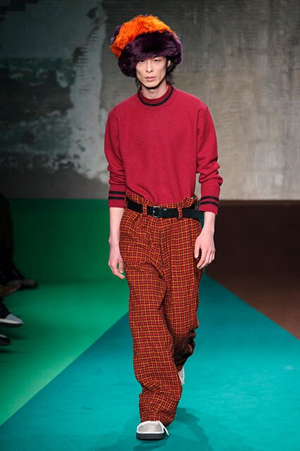 Catwalk model wearing corduroy trousers and a patterned jumper | ASOS Style Feed