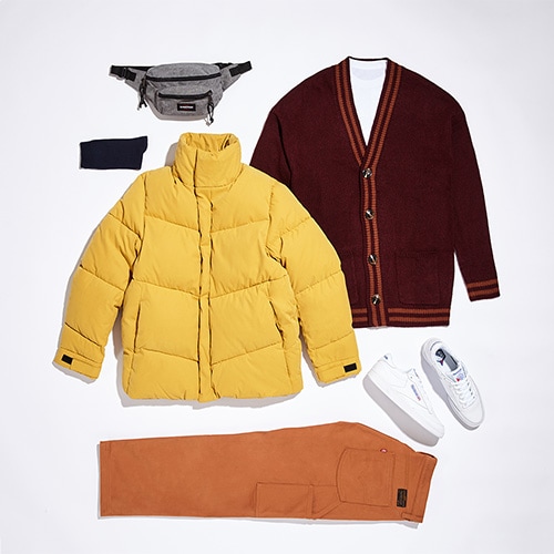 Your autumn outfit featuring a white T-shirt, burgundy cardigan, rust-coloured Levi's trousers, grey bumbag, black socks and white Reebok Club C 85s | ASOS Style Feed