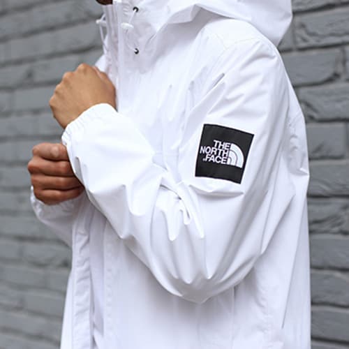 Street styler in a white The North Face jacket | ASOS Style Feed