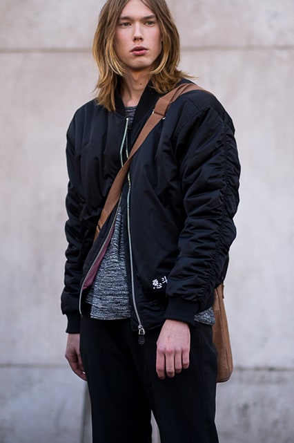Stylish guys in transitional jackets featuring a street styler in a black bomber jacket | ASOS Style Feed