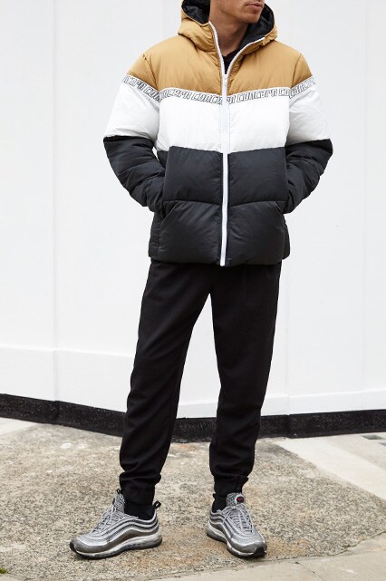 ASOSer wearing an ASOS puffer jacket, a vintage shirt, Marni trousers and Nike Air Max 97 trainers | ASOS Style Feed 