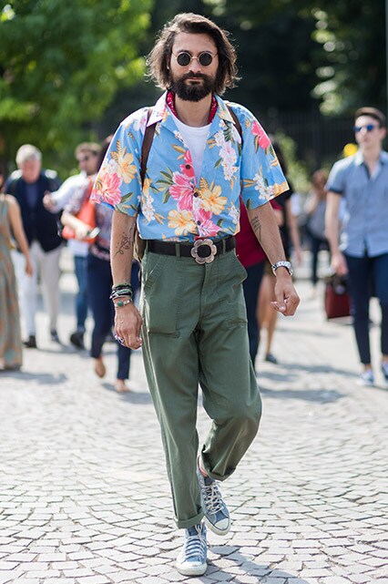A street-styler wearing a white T-shirt, Hawaiian shirt and khaki chinos | ASOS Style Feed