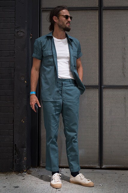 A street-styler wearing a white T-shirt and a teal co-ord | ASOS Style Feed