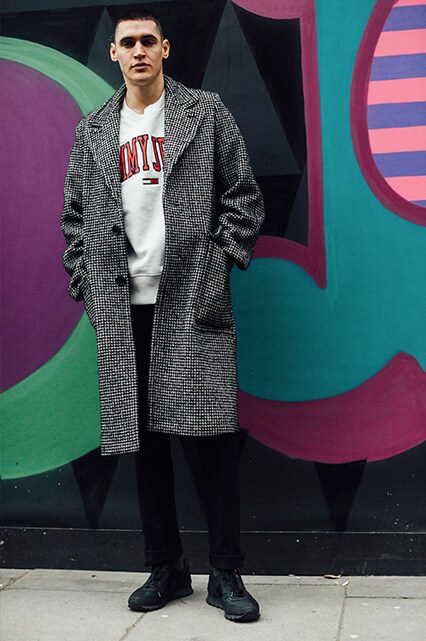 A street-styler in a Tommy Hilfiger sweatshirt | ASOS Style Feed 