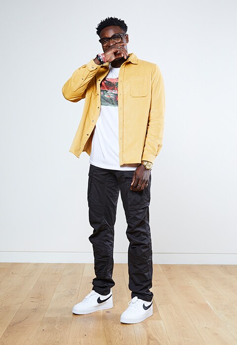 Babatunde wearing an ASOS DESIGN T-shirt and shacket, G-Star cargo pants and Nike Air Force 1s | ASOS Style Feed