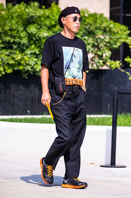 An all-black outfit at Milan Fashion Week