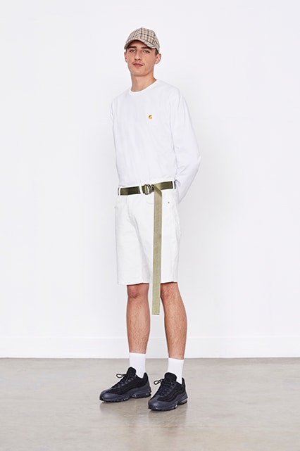 An ASOS model wearing a Carhartt WIP top, shorts, Air Max 97s and a check cap | ASOS Style Feed