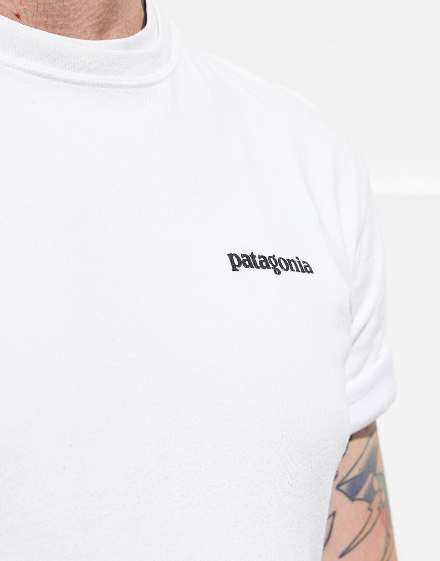 A close-up shot of Tom's Patagonia T-shirt | ASOS Style Feed