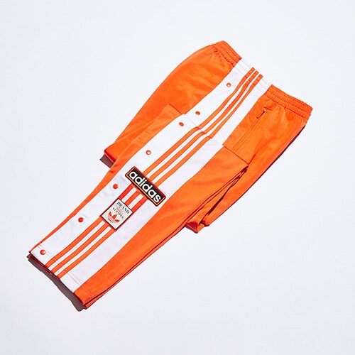 Jogging adidas orange disponible sur asos