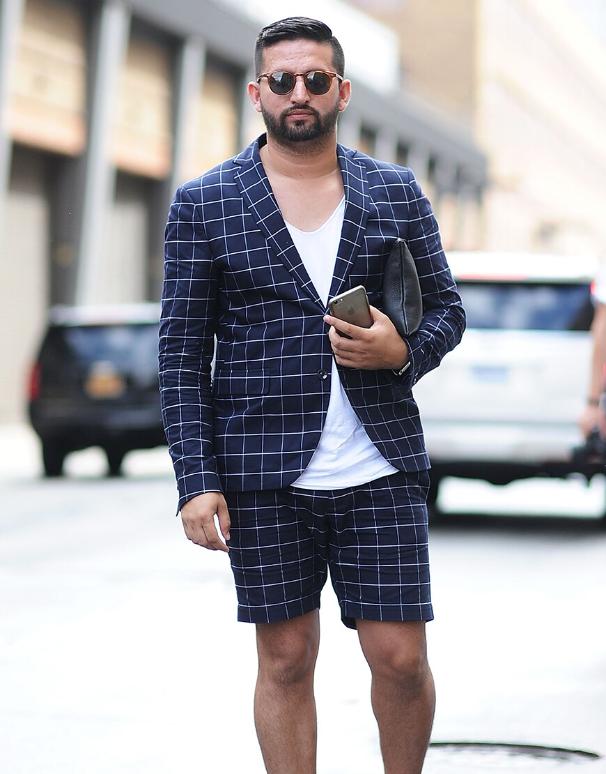 A street-styler wearing a check suit | ASOS Style Feed