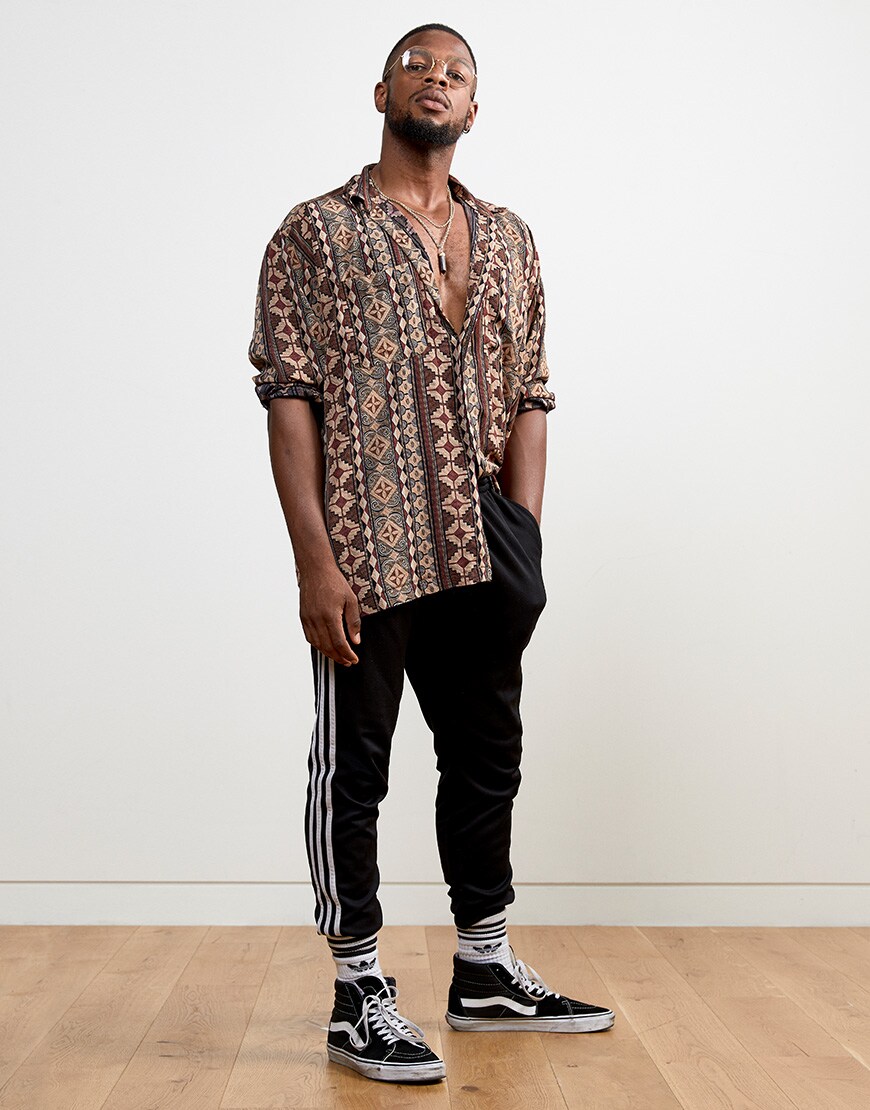 Daniel wearing a patterned shirt, adidas joggers and Vans trainers | ASOS Style Feed