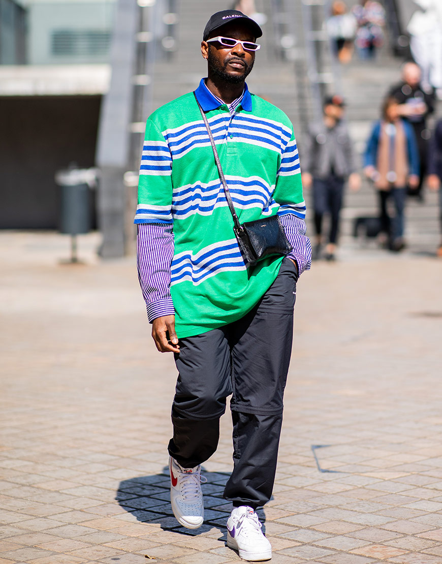 A street-styler in a striped shirt and a striped polo-neck top | ASOS Style Feed