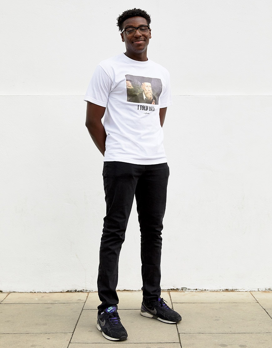 Babatunde wearing graphic-print T-shirt, jeans and Nike trainers | ASOS Style Feed