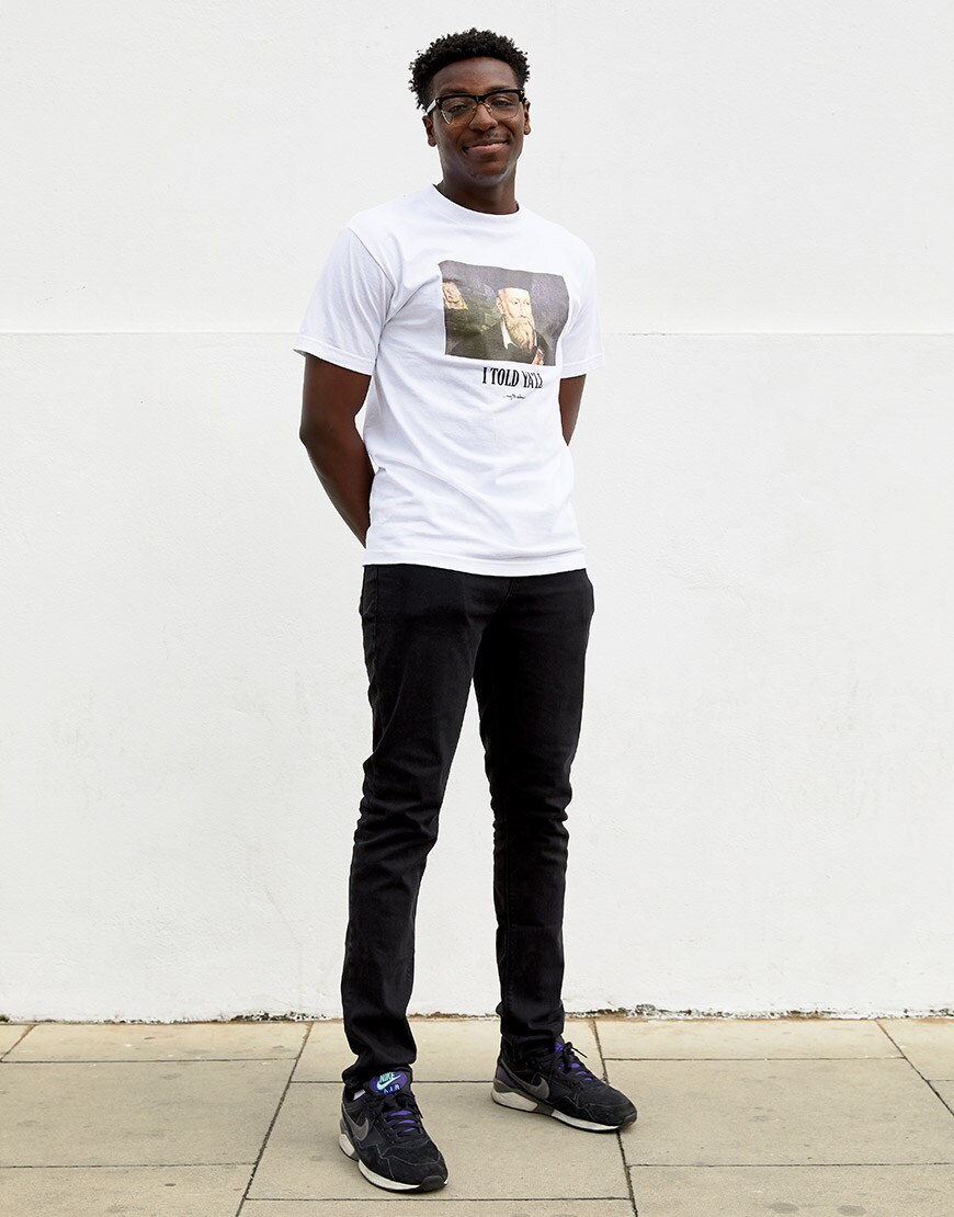 Babatunde wearing graphic-print T-shirt, jeans and Nike trainers | ASOS Style Feed