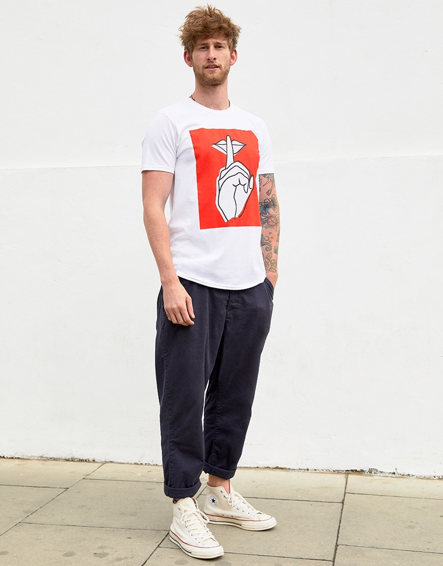 Tom wearing a graphic-print T-shirt, blue jeans and Converse All Star trainers | ASOS Style Feed