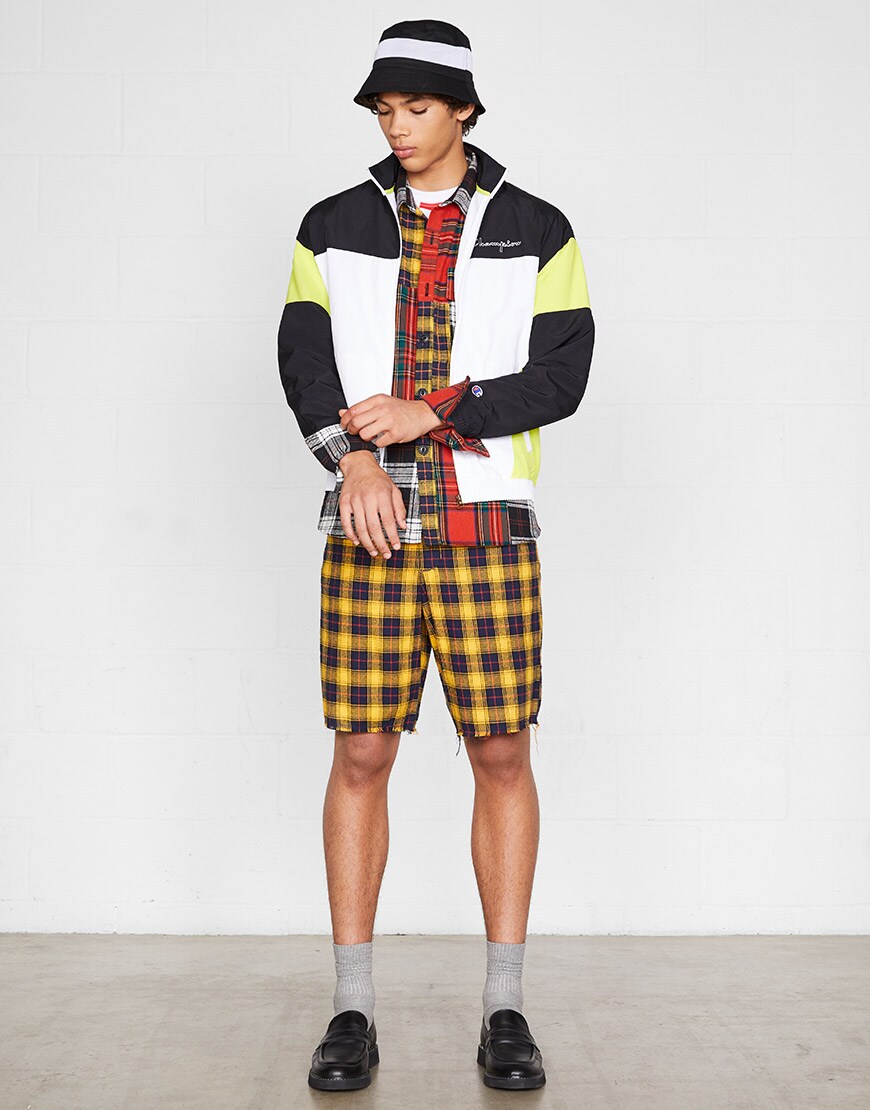 A model wearing a check co-ord, colour-block jacket, bucket hat and loafers | ASOS  Style Feed