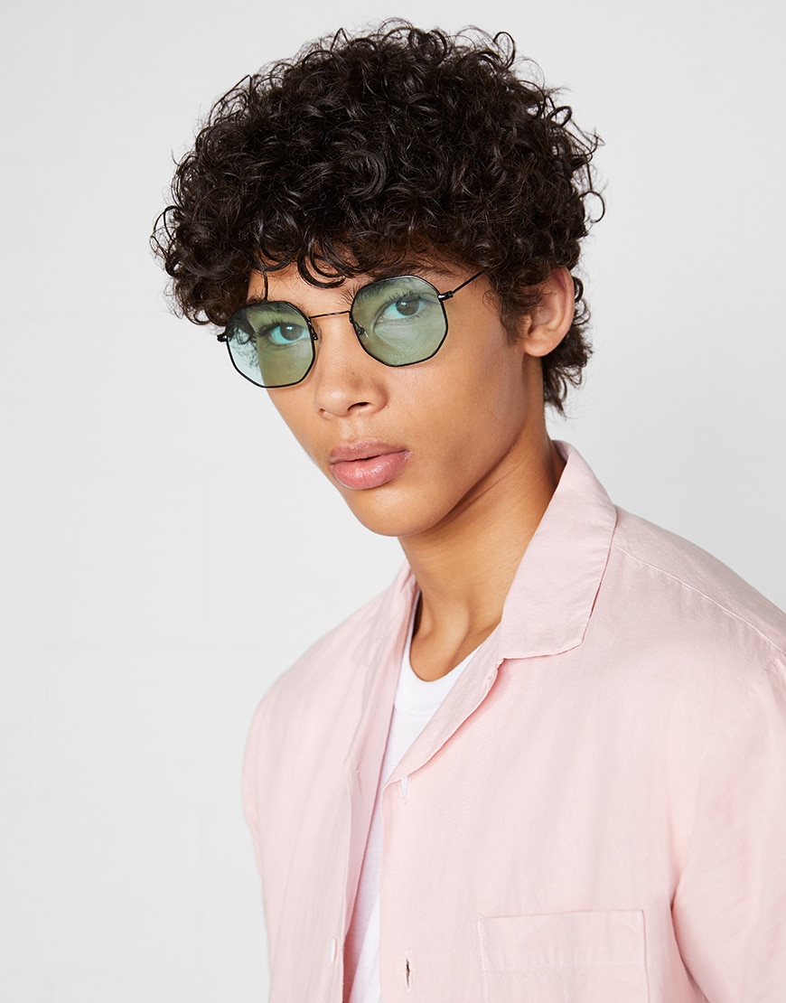 A model wearing shades and a pink shirt | ASOS Style Feed