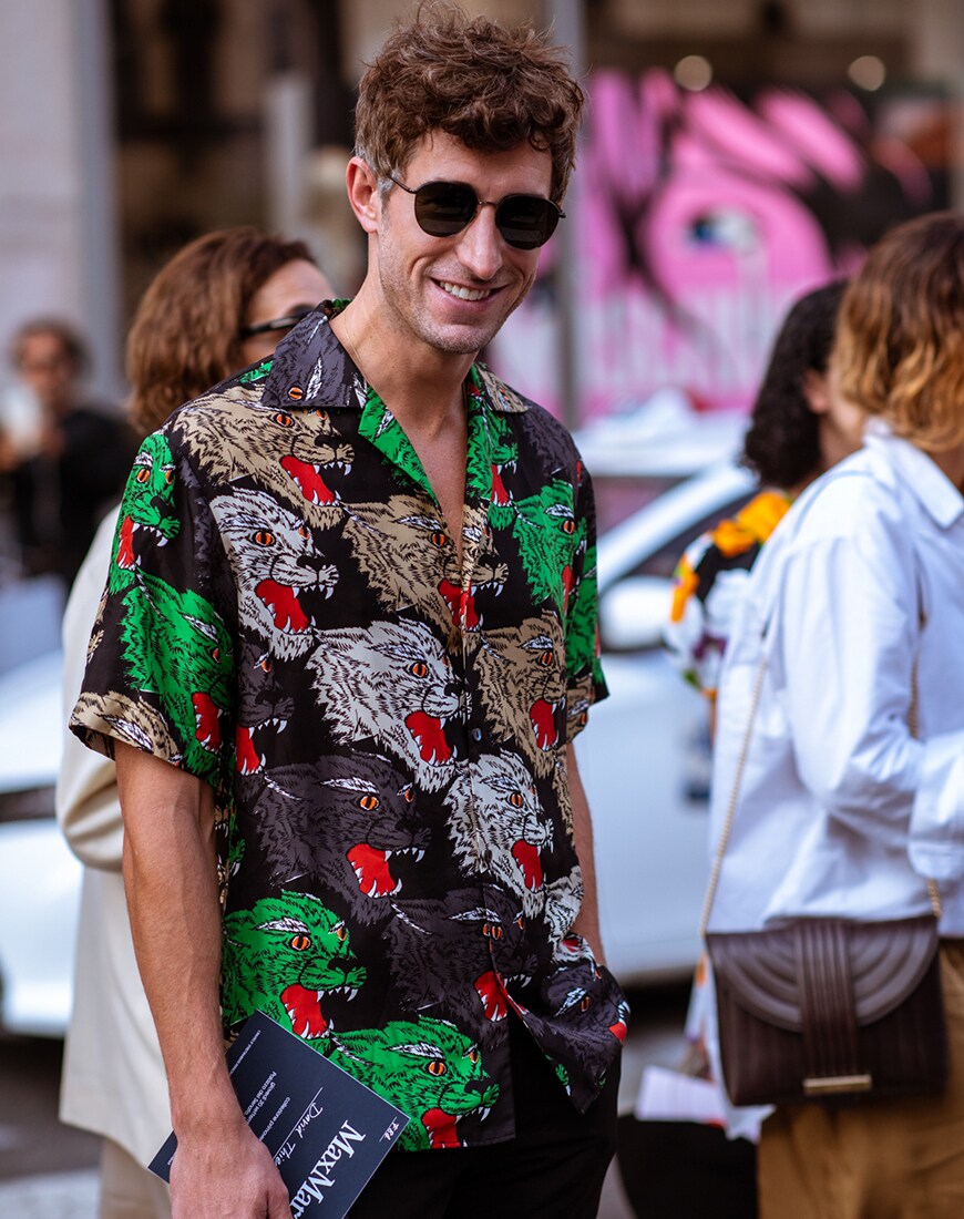Milan fashion week showgoer in a Gucci shirt | ASOS Style Feed