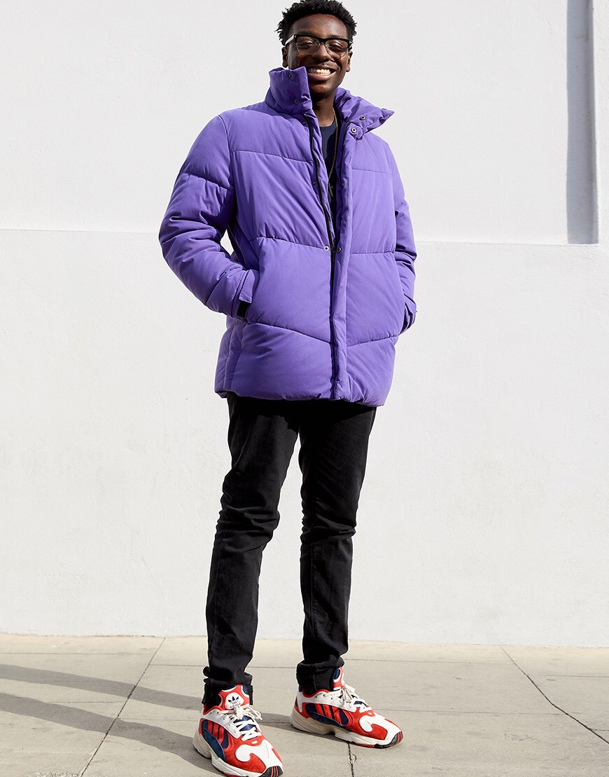 Babatunde wearing a purple puffer Jacket, ASOS DESIGN Black skinny Jeans and adidas Yung 1 sneakers | ASOS Style Feed