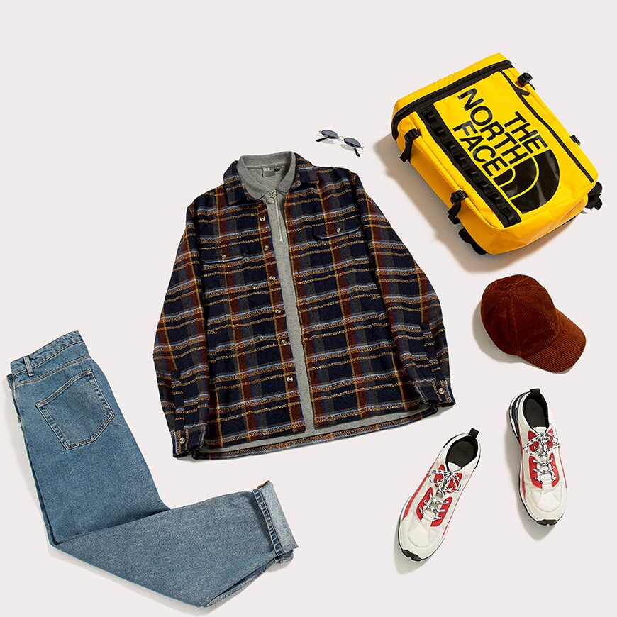 A half-zip sweatshirt, plaid shirt, mid-wash blue jeans, The North Face backpack, shades and chunky trainers available at ASOS | ASOS Style Feed