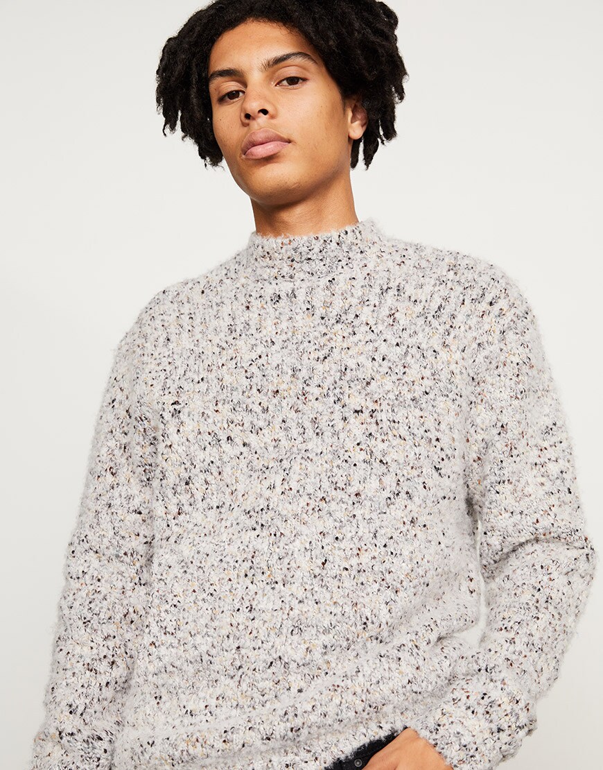 A model wearing a knitted jumper available at ASOS | ASOS Style Feed