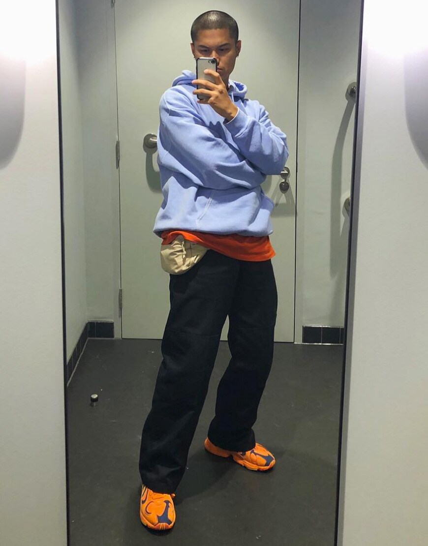 @asos_nawal wearing a blue hoodie, cream bum bag, Dickies work pants and adidas YUNG-1 trainers | ASOS Style Feed