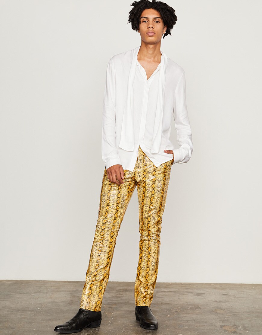 A model wearing a white shirt, snakeskin trousers and boots available at ASOS | ASOS Style Feed