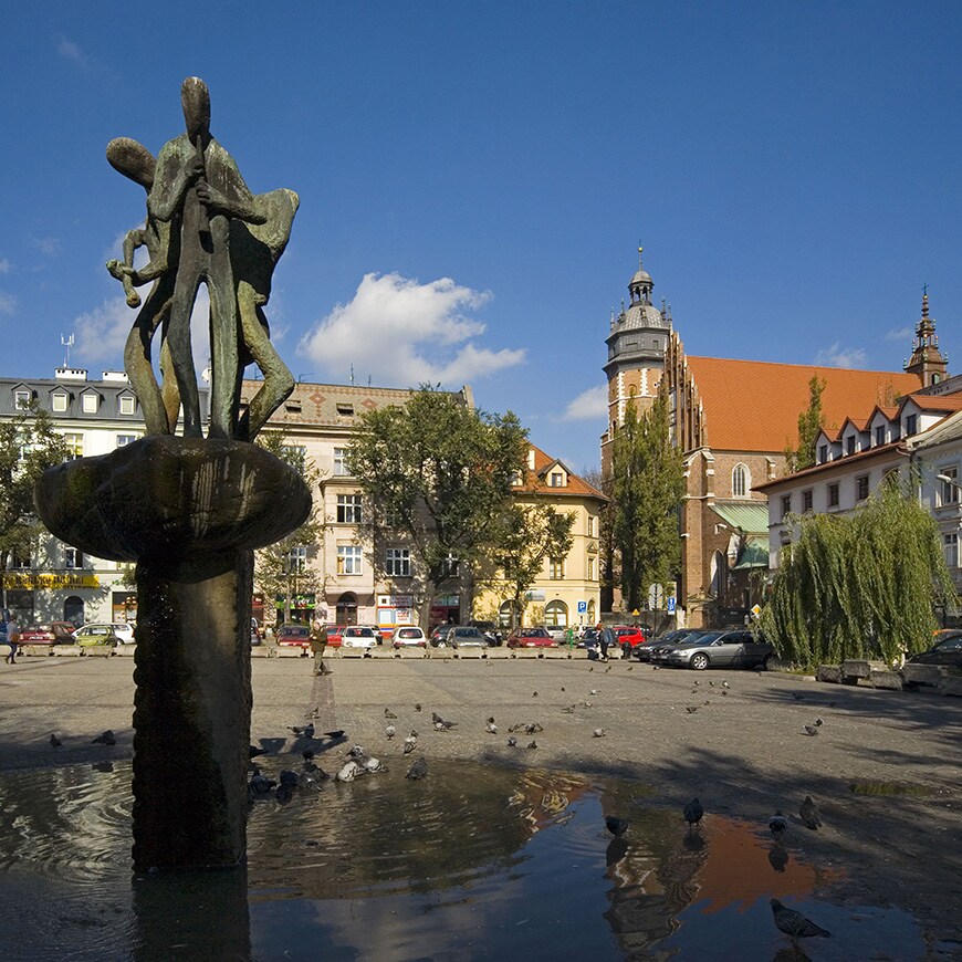 A shot of a fountain in Kraków, Poland | ASOS Style Feed