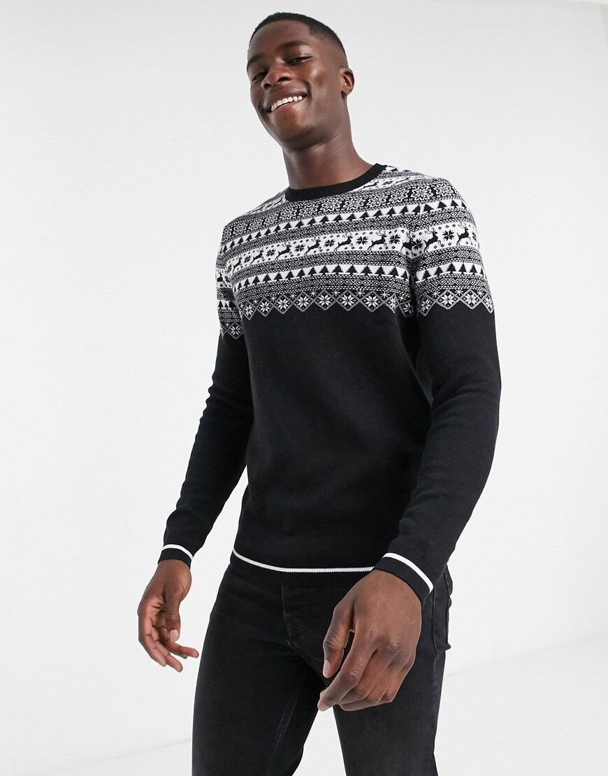 Model wearing ASOS DESIGN knitted yoke fairisle jumper in black