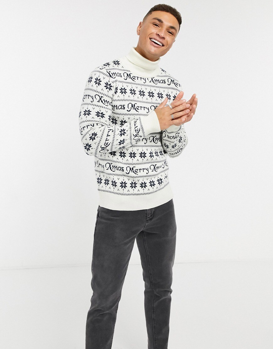 Model wearing New Look Merry Xmas roll neck knitted jumper